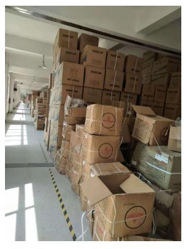 Warehouse aisle with packed sporting goods